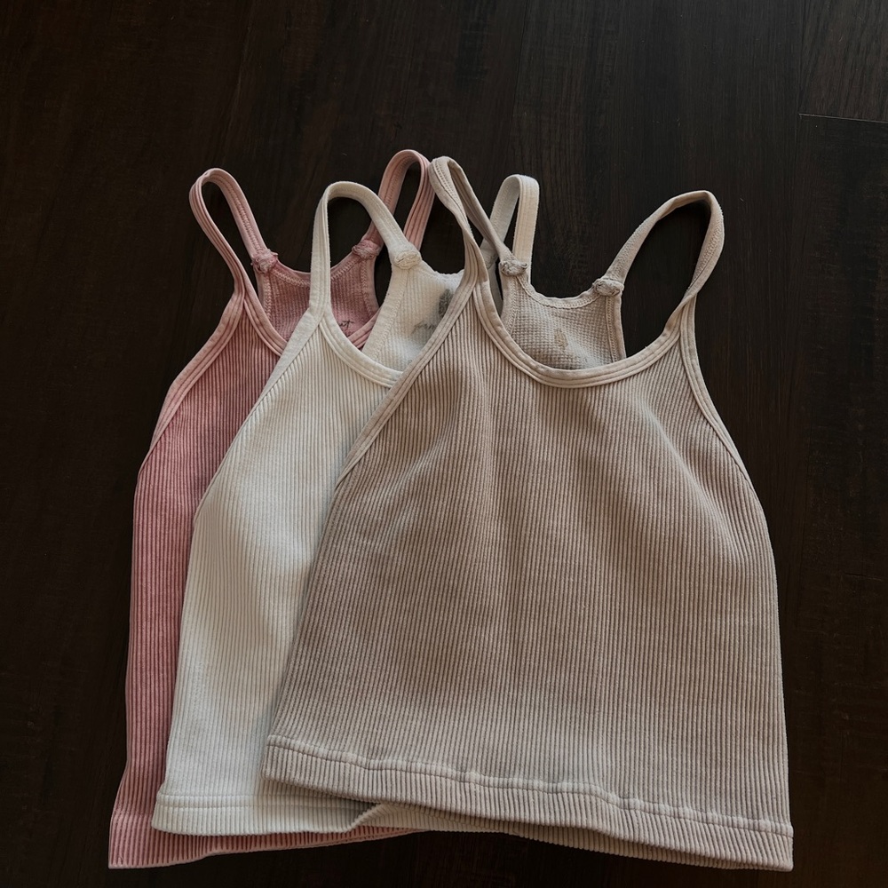 Set of Three Ribbed Tank Tops in Pink, White, and Tan